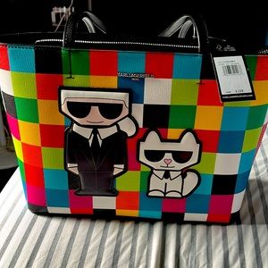 Karl Lagerfeld bag, new with tags. Zip closure, back pocket, 3 interior pockets.